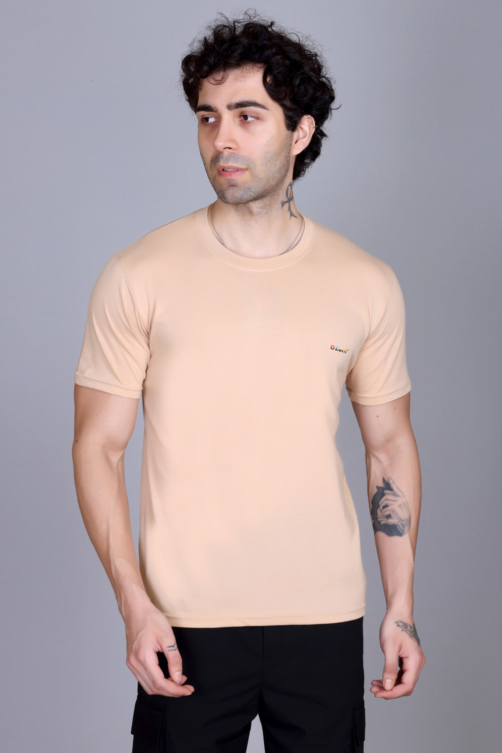Elegant beige t-shirt highlighting premium fabric quality